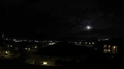 Day to Night Time Lapse of Super Moon Moving Through Clouds Stock Footage 34694241
