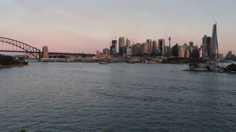 Day to night time lapse in Sydney city via Harbour to CBD waterfront as 4k. Stock Footage 138904260