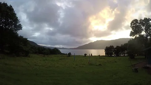 Day to Night time lapse - Time Heavy dramatic Dark Clouds show the never ending Stock Footage 80100296