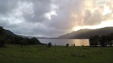 Day to Night time lapse - Time Heavy dramatic Dark Clouds show the never ending 動画素材 80100307