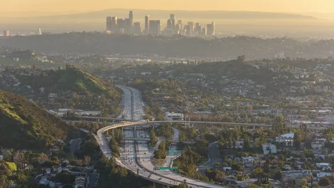 Day to night time lapse view of the Glendale 2 freeway and Downtown Los Angeles Stock Footage 102062593