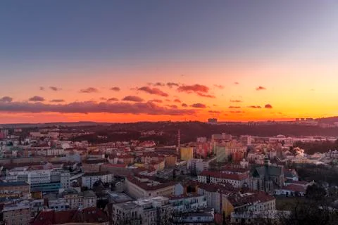 Day to night time-lapse when Brno city square and surroved area goes from sun 写真素材