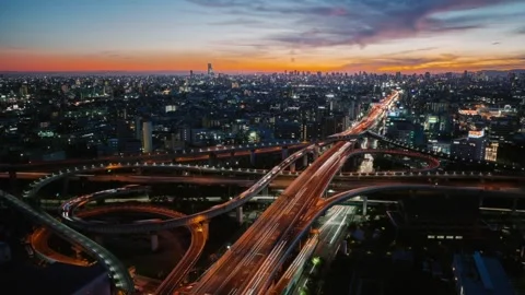 Day to Night Timelapse of Highway Junction in Osaka Japan with Traffic Flow Video stock 331715494