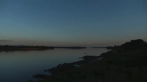Day to night timelapse of Mekong river and Nakhon Phanom riverside Stock Footage 155047820
