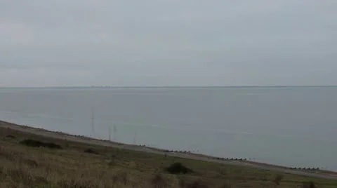Day to night timelapse of Minster bay, tide going out Stock Footage 21931074