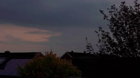 Day To Night Timelapse with Solar Panneled Roof Stock Footage 240184228