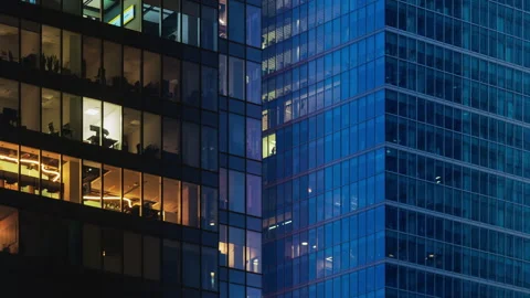 Day to night transition office windows, high-rise skyscrapers financial district Stock Footage 304286584