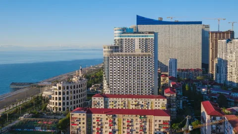 Day to night transition timelapse of Batumi skyline Stock Footage 336372619