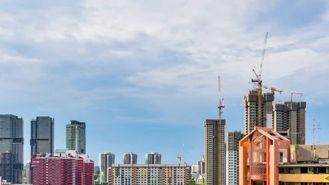 Day to Night view of Construction site in Downtown Singapore skyline with clouds Stock Footage 74880199