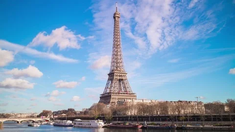Day paris most eiffel tower seine river panorama 4k time lapse france Stock Footage 74691144