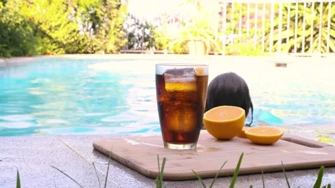 Day in the pool and drinking a cocktail Stock Footage 220150885