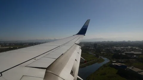Day shot of Airplane landing Stock Footage 87274792