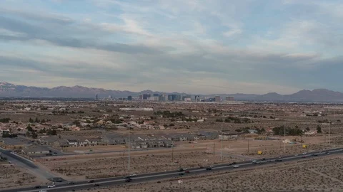 Day, sunset to dusk timelapse of Las Vegas with city skyline and passing clouds Stock Footage 122389912
