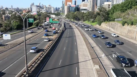 Day time commute traffic on highway in North Sydney to the Bridge as 4k. Stock Footage 155283502