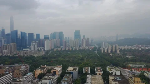 Day time flight over shenzhen cityscape downtown aerial panorama 4k china Stock Footage 107642338