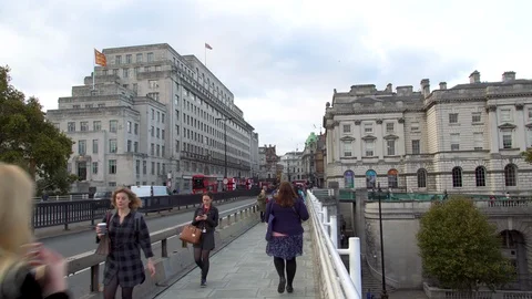 Day time London Waterloo Bridge people walking car traffic. Stock Footage 101683878