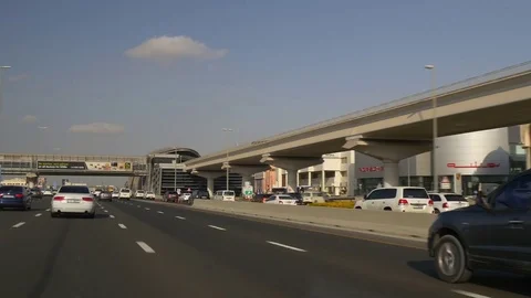 Day time sunset dubai main pov car driving metro side panorama 4k uae Stock Footage 79821426