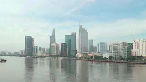 Day traffic on the Ba Son Bridge. Awesome Saigon skyline Stock Footage 273840190