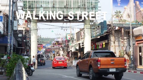 Day traffic оn famous red light district Walking street in Pattaya Stock Footage 105254584
