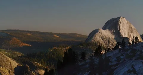 Day transitions to evening on the backside of iconic Half Dome. Stock Footage 268759770