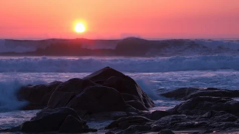 Day turns to night time lapse at sunset on the beach. Sun drops below horizon Stock Footage 105160877