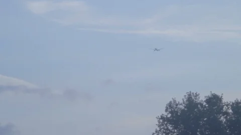 Day view of airplane flying, static shot Video stock 93952633