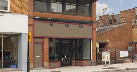 Day View of Generic Small Town Business Storefront 스톡 동영상 123442603