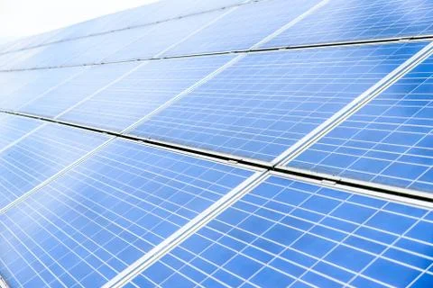 Day view solar panel system installed on UK field 写真素材