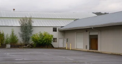 Day warehouse and empty parking lot Stock Footage 86767412