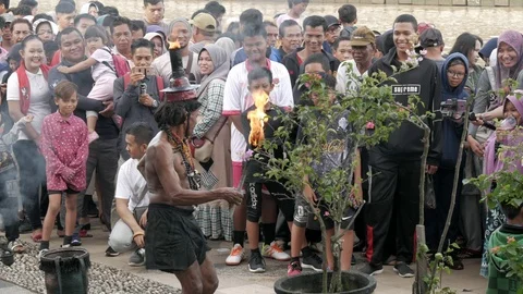 Dayak tribe street performance, the fire show Stock Footage 111146351