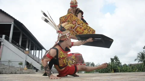 The Dayaks jump over the shield Stock Footage 147114230