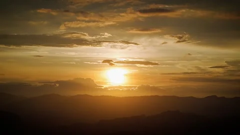 Daybreak Blaze Over Cloud-Swept Highlands Stock Footage 316795926