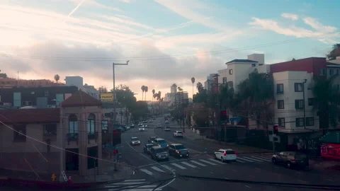 Daylight comes to Sunset Blvd and Vin Scully Ave Stock Footage 239221892