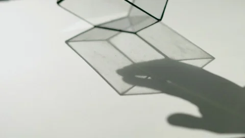 Daylight effect, shadow from the hands of a couple on the background of a glass  Stock Footage 128086302