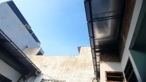Daylight Half Moon above Building 스톡 동영상 335524593