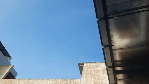 Daylight Half Moon, Far View from Home Video stock 335524596