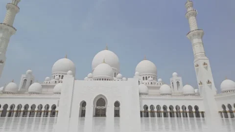 Daylight Panning of Sheikh Zayed Grand Mosque Architecture Against Abu Dhabi Stock Footage 327330324