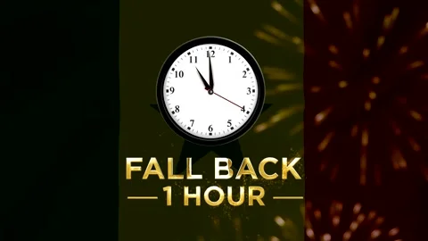 Daylight saving time concept with a clock showing fall back one hour agains.. Stock Footage 346542199