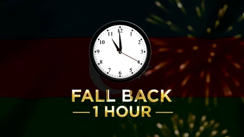 Daylight saving time concept with a clock showing fall back one hour agains.. 스톡 동영상 346542206