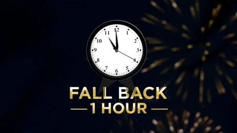 Daylight saving time concept with a clock showing fall back one hour golden.. 動画素材 346542315