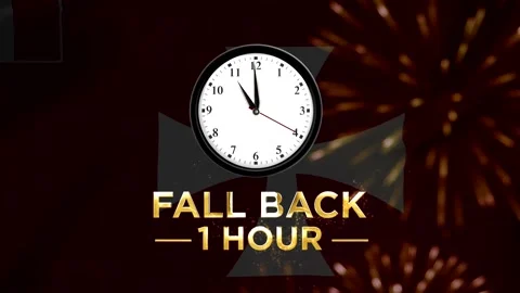 Daylight saving time concept with a clock showing fall back one hour text Видео 346542360