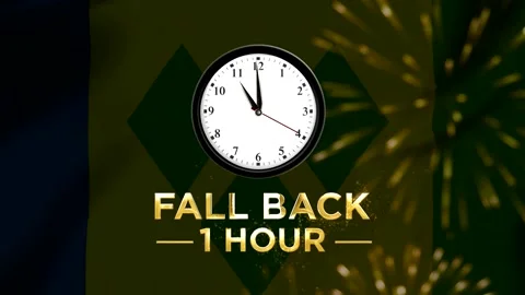 Daylight saving time concept with a clock showing the fall back one hour re.. 스톡 동영상 346542406