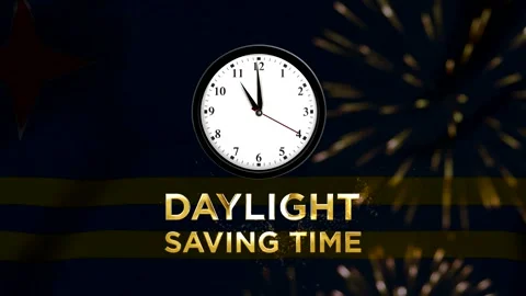 Daylight saving time concept featuring a wall clock over the national flag .. Stock Footage 346541530