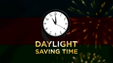Daylight saving time concept featuring a wall clock with text on a glowing .. 動画素材 346541560