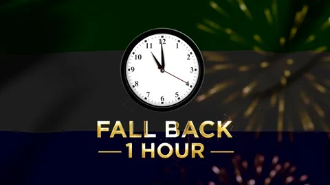 Daylight saving time concept featuring a clock showing fall back one hour w.. 스톡 동영상 346542008