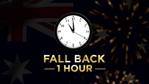 Daylight saving time concept featuring an analog clock over an Australian f.. 스톡 동영상 346542062