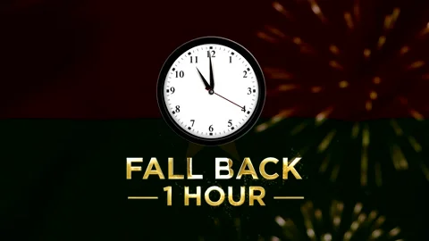 Daylight saving time concept showing a wall clock with text fall back one h.. 스톡 동영상 346542115