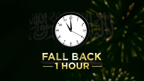 Daylight saving time concept showing a wall clock with text fall back one hou Stock Footage 346542127