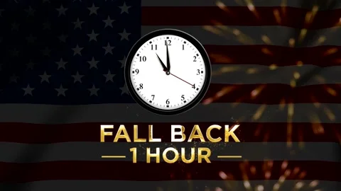 Daylight saving time concept with wall clock and fall back one hour text ov.. 스톡 동영상 346542445
