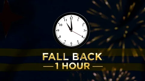 Daylight saving time concept with wall clock and fall back one hour text ov.. 스톡 동영상 346542450